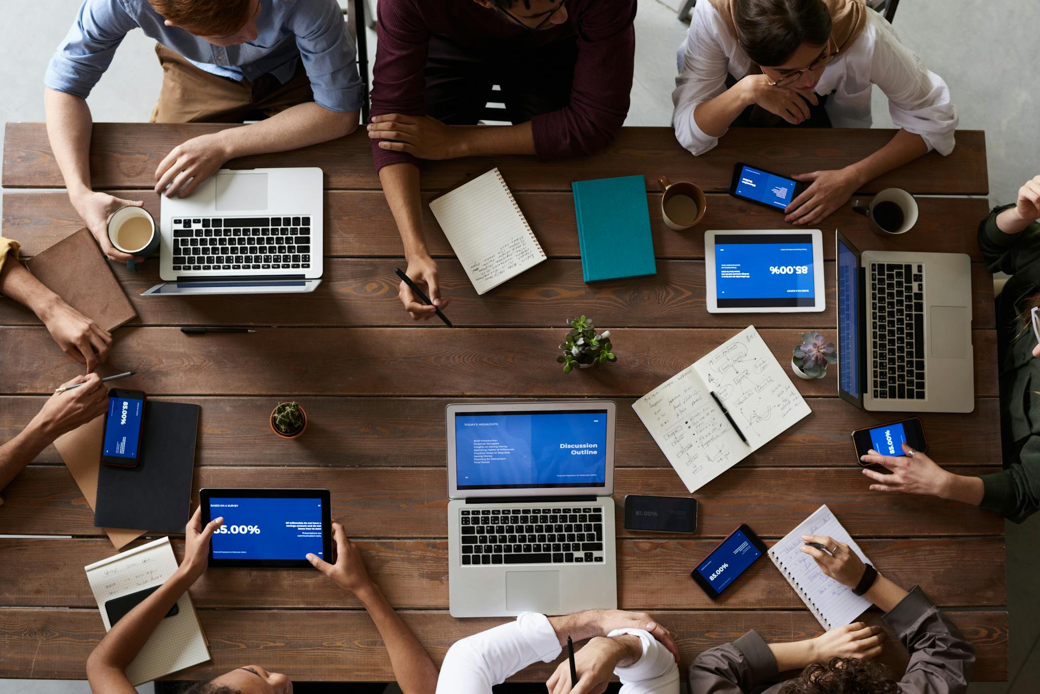 Professional content creatives meeting in an office setting.