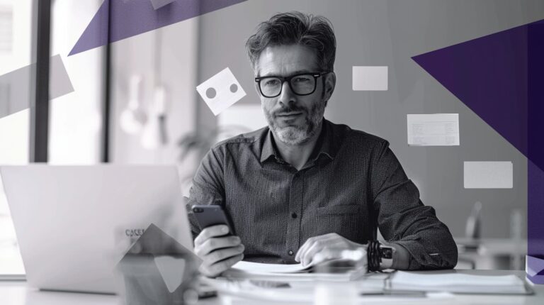 B2B marketer working at desk, concerned over website UX (user experience).