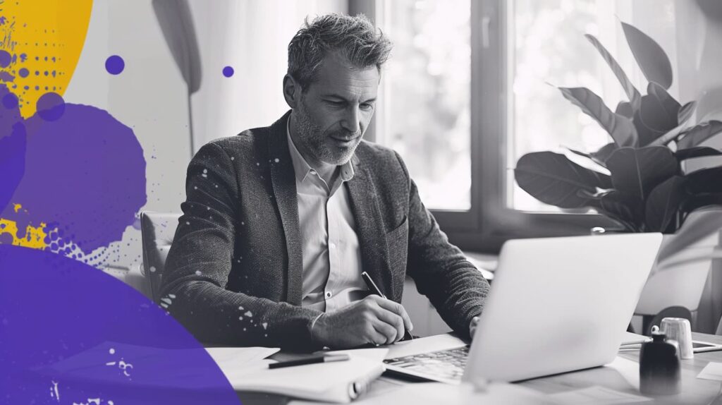 Marketer auditing sales content on laptop for improvements.